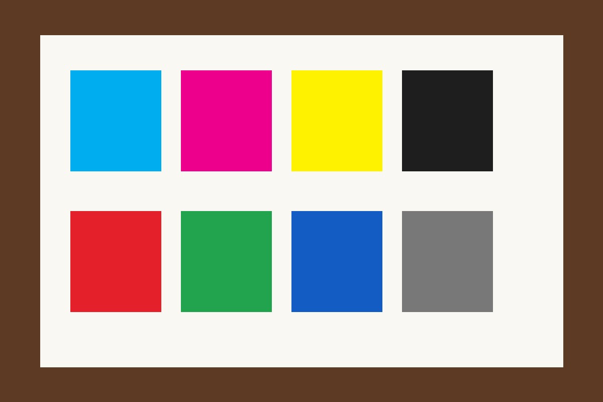 CMYK and RGB color swatches laid on a print sheet