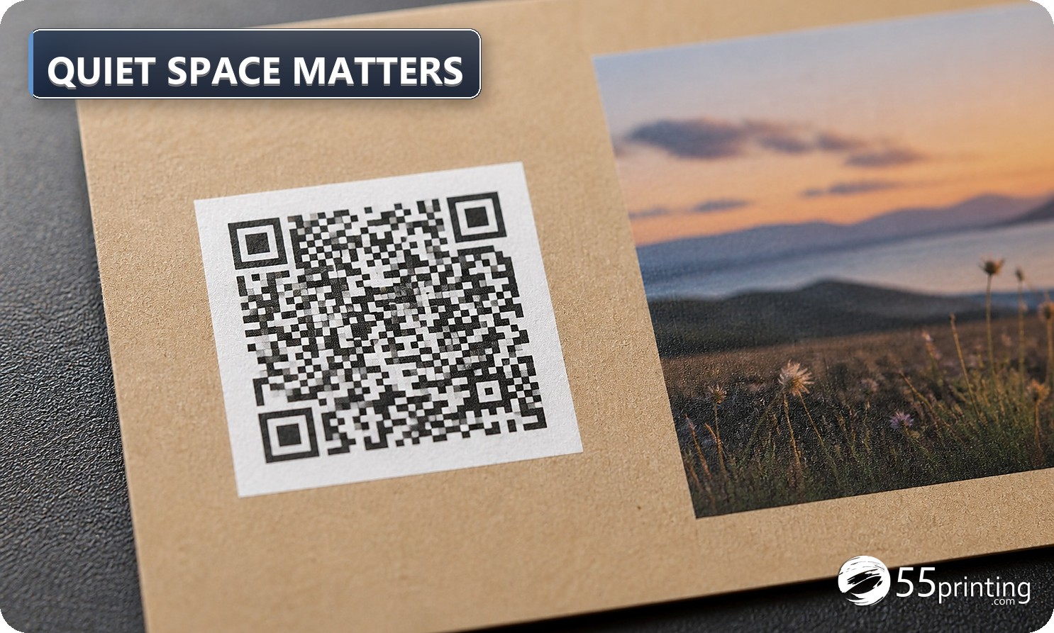 Close-up of a printed business card with a QR code and quiet white space around the mark